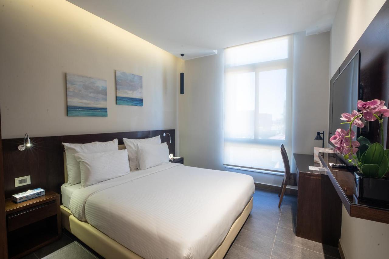 เดอะ คอมพาส โฮเต็ล Hotel อัมมาน ภายนอก รูปภาพ