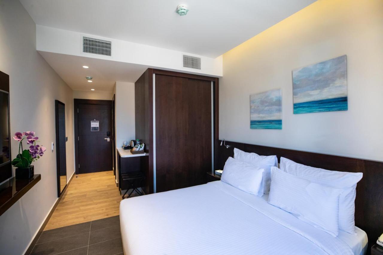 เดอะ คอมพาส โฮเต็ล Hotel อัมมาน ภายนอก รูปภาพ